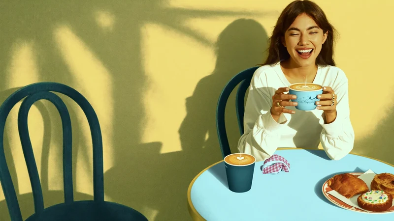 Illustrazione di una scena di caffè e colazione in stile editoriale